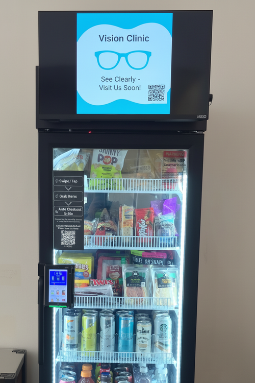 JL Smart Vending machine displaying Vision Clinic advertisement on digital screen